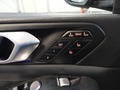 View of control buttons for electric seat adjustment