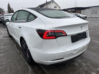 Вид сзади слева