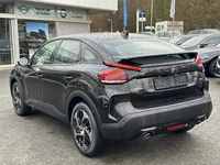 Вид сзади слева