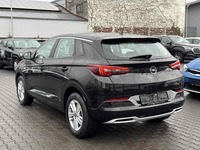 Вид сзади слева