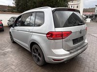 Вид сзади слева