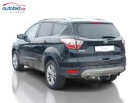 Vista traseira esquerda