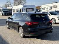 Вид сзади слева