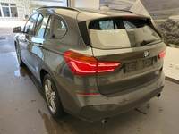 Вид сзади слева