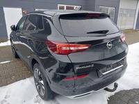 Вид сзади слева