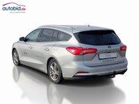 Вид сзади слева