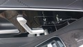 View of control buttons for electric rear seat adjustment