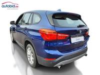 Вид сзади слева