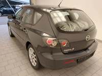 Вид сзади слева