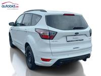 Вид сзади слева