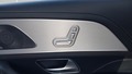 View of control buttons for electric rear seat adjustment