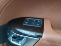 View of control buttons for electric rear seat adjustment