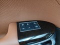 View of control buttons for electric rear seat adjustment