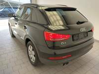 Vista traseira esquerda