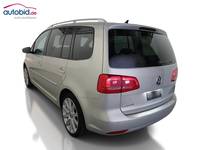 Vista traseira esquerda