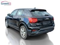 Вид сзади слева