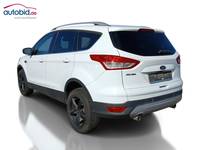 Вид сзади слева