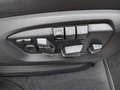 View of control buttons for electric seat adjustment