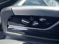 View of control buttons for electric rear seat adjustment