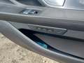 View of control buttons for electric rear seat adjustment