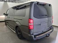 Вид сзади слева