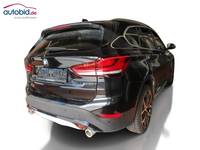 Skats no labās puses aizmugurē