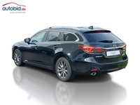 Vista traseira esquerda