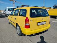 Вид сзади слева