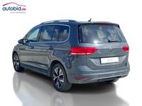 Vista traseira esquerda