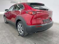 Skats no kreisās puses aizmugurē