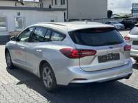 Вид сзади слева