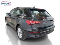 Вид сзади слева