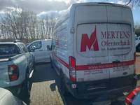 Вид сзади слева