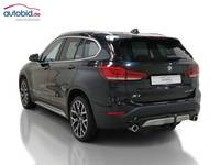 Вид сзади слева