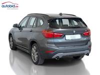 Вид сзади слева