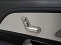 View of control buttons for electric rear seat adjustment