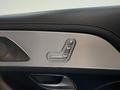 View of control buttons for electric rear seat adjustment