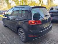 Вид сзади слева