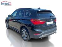 Вид сзади слева