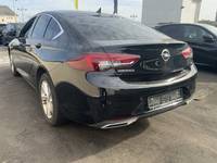 Вид сзади слева