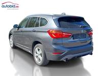 Vista traseira esquerda