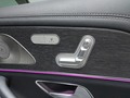 View of control buttons for electric rear seat adjustment