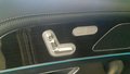 View of control buttons for electric rear seat adjustment
