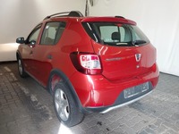 Skats no kreisās puses aizmugurē