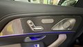 View of control buttons for electric rear seat adjustment