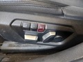 View of control buttons for electric seat adjustment