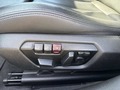 View of control buttons for electric seat adjustment