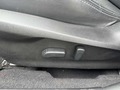 View of control buttons for electric seat adjustment