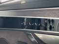 View of control buttons for electric rear seat adjustment