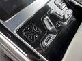 View of control buttons for electric rear seat adjustment
